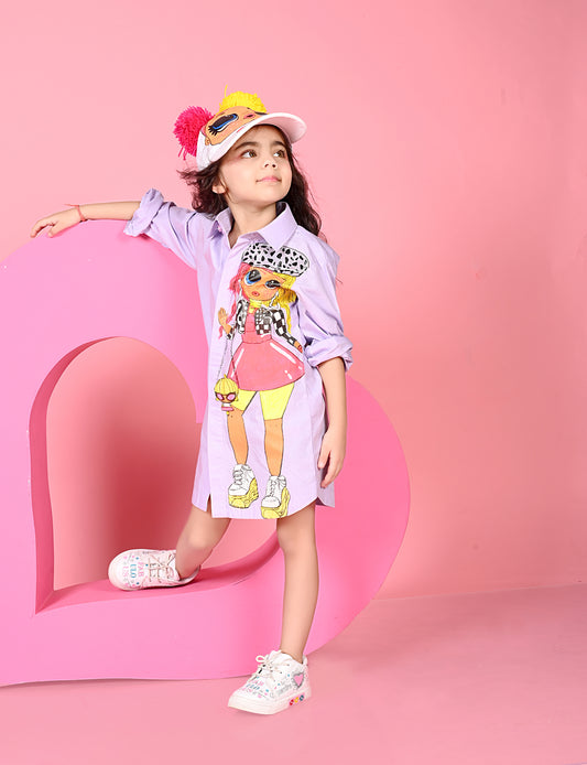 Child wearing a colorful outfit with a cartoon character on a pink background